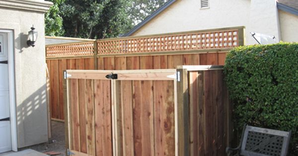 lattice top wood fence hiding trash Temecula
